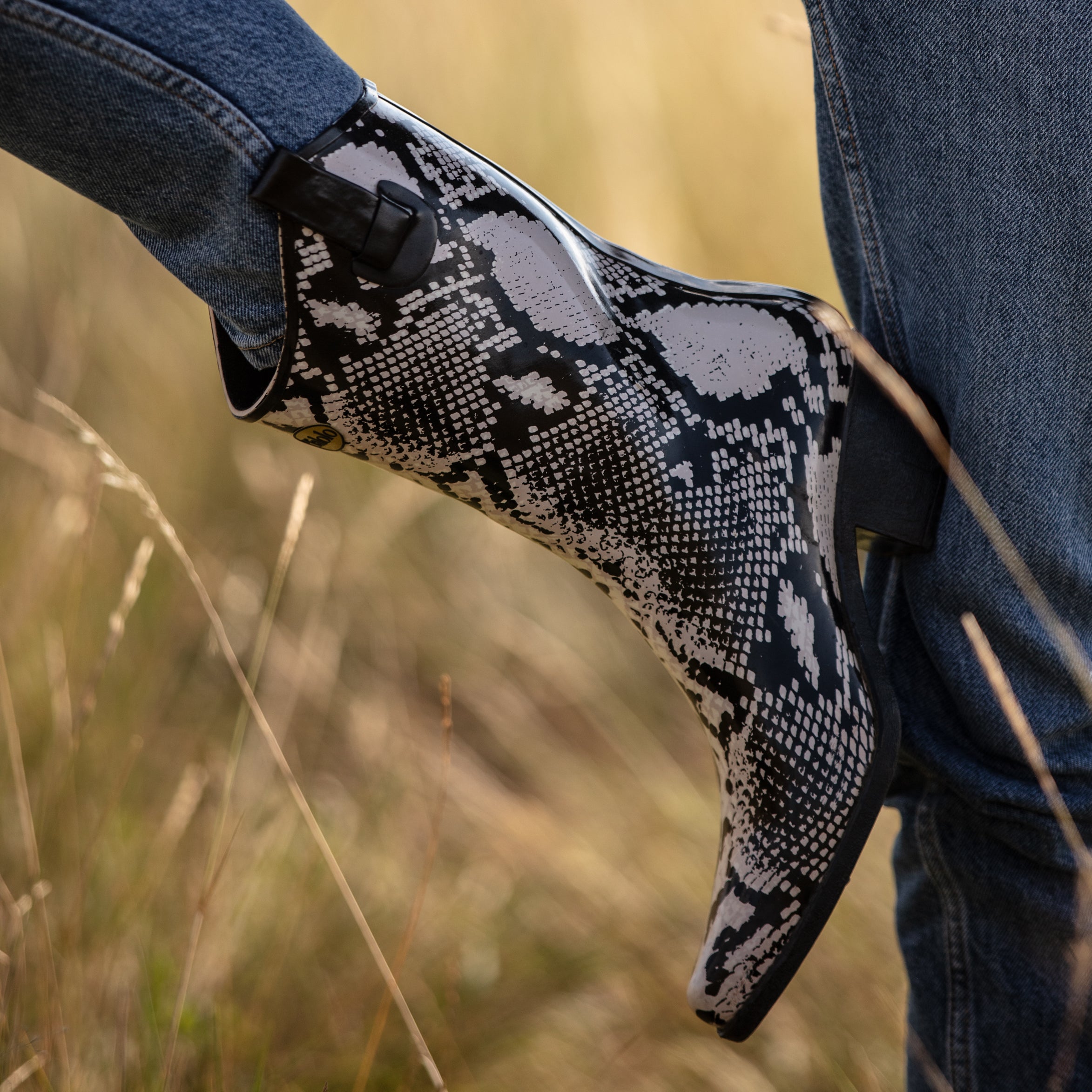 Chic and stylish, these Talolo Women's Bandy snake patterned black and white cowboy welly boots have a 3cm heel and will reach the middle of the calf. Cut close to the leg for a hot flattering look.  Lined for comfort.