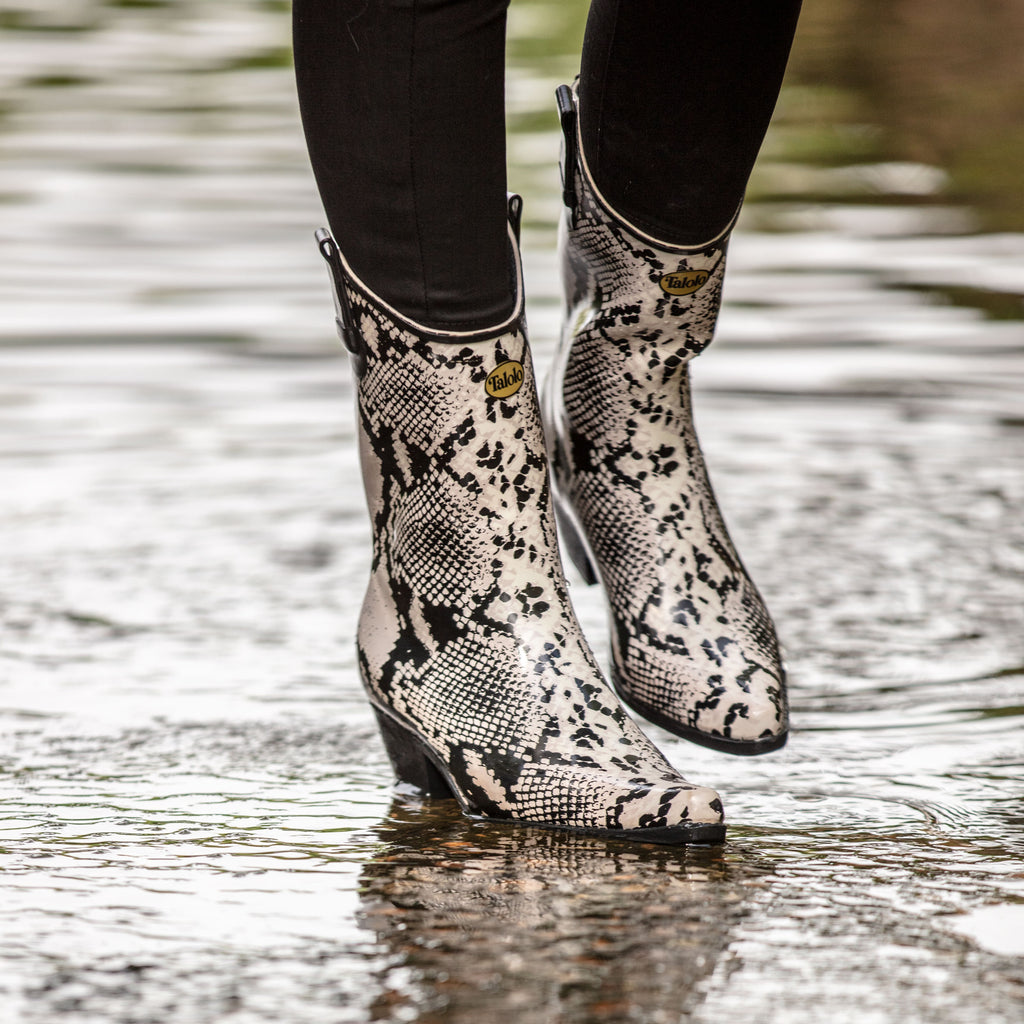 Chic and stylish, these Talolo Women's Bandy snake patterned black and white cowboy welly boots have a 3cm heel and will reach the middle of the calf. Cut close to the leg for a hot flattering look.  Lined for comfort.
