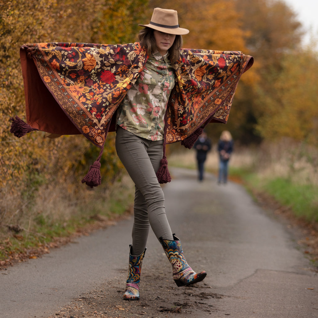 Wild, bright and super funky with prints of pink, blue and yellow, these Talolo Women's Floral Bliss pointed cowboy welly boots have a 3cm heel and will reach the middle of your calf. Lined for comfort.