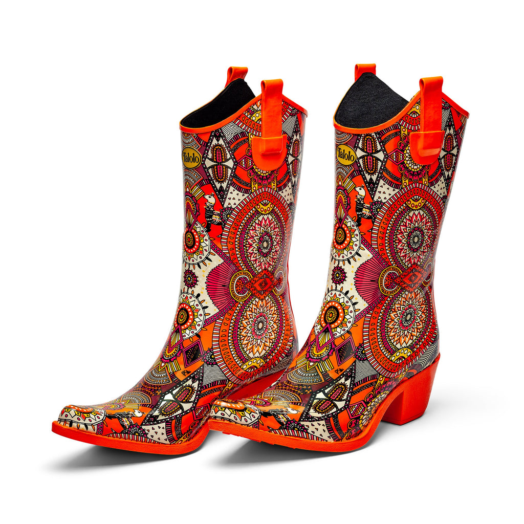 Zesty and full of life, these Talolo Women's orange aztec patterned, funky cowboy welly boots are heeled to give you sophistication and will reach the middle of the calf. Lined for comfort.