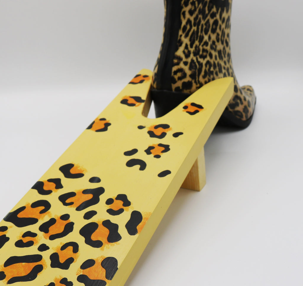 Utterly fabulous hand painted yellow leopard print Boot Jack or welly boot puller by Talolo Boots. This Leopard print design complements our Leopard ankle boots, and, like the boots, they are original and add some happiness and colour into everyday life.