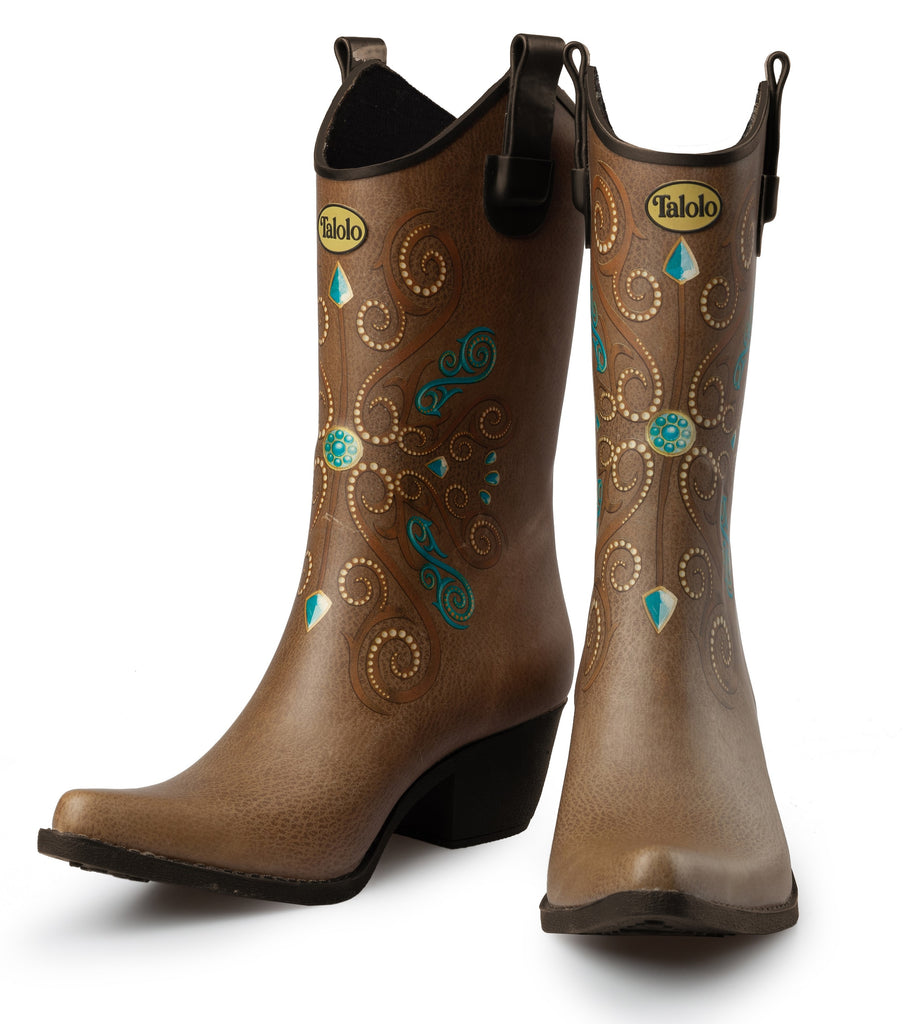 Hit up those American country vibes with these Talolo Women's Dallas  Dreamer western cowgirl welly boots. Brown leather-like base with a smooth flat turquoise jewel motif. Pointed cowboy welly boots have a 3cm heel and that will reach the middle of the calf. Lined for comfort.